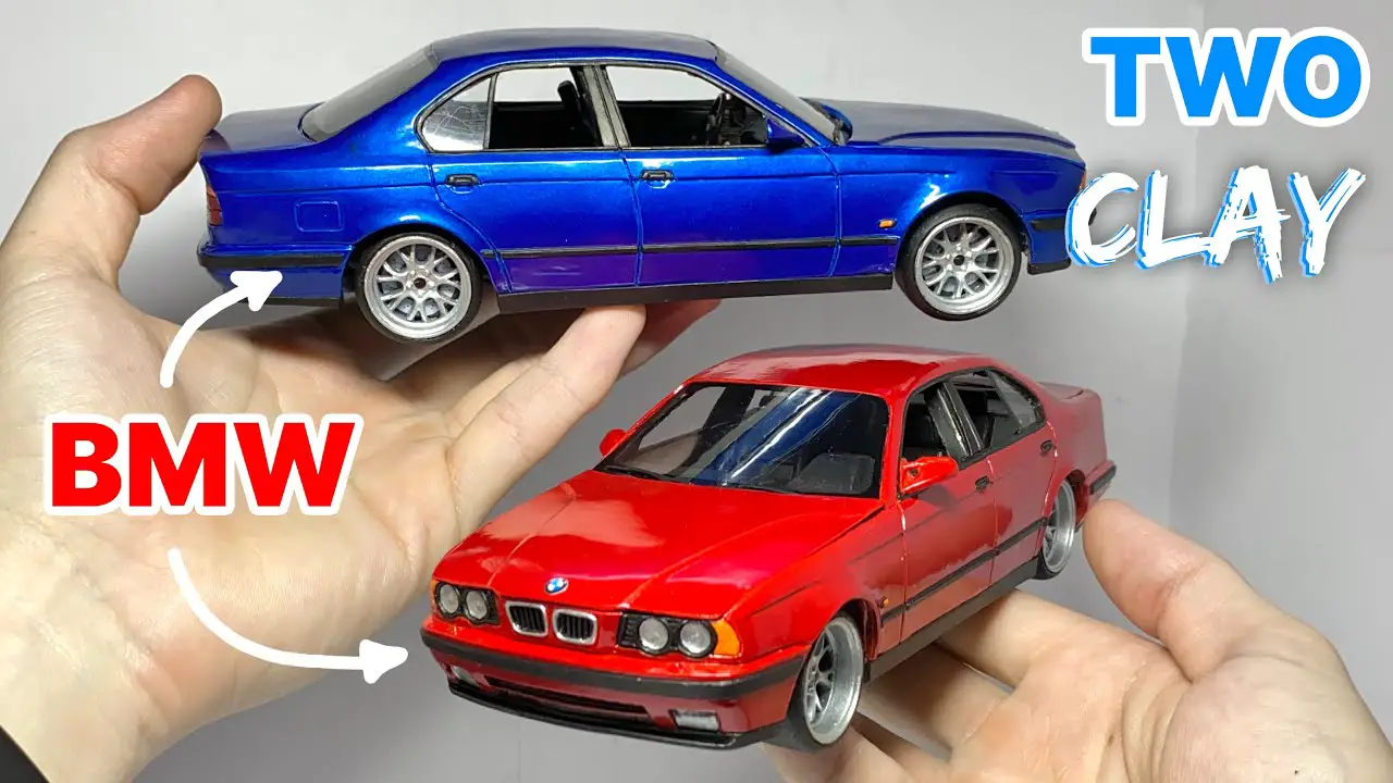 Two BMW M5 handmade of plasticine clay