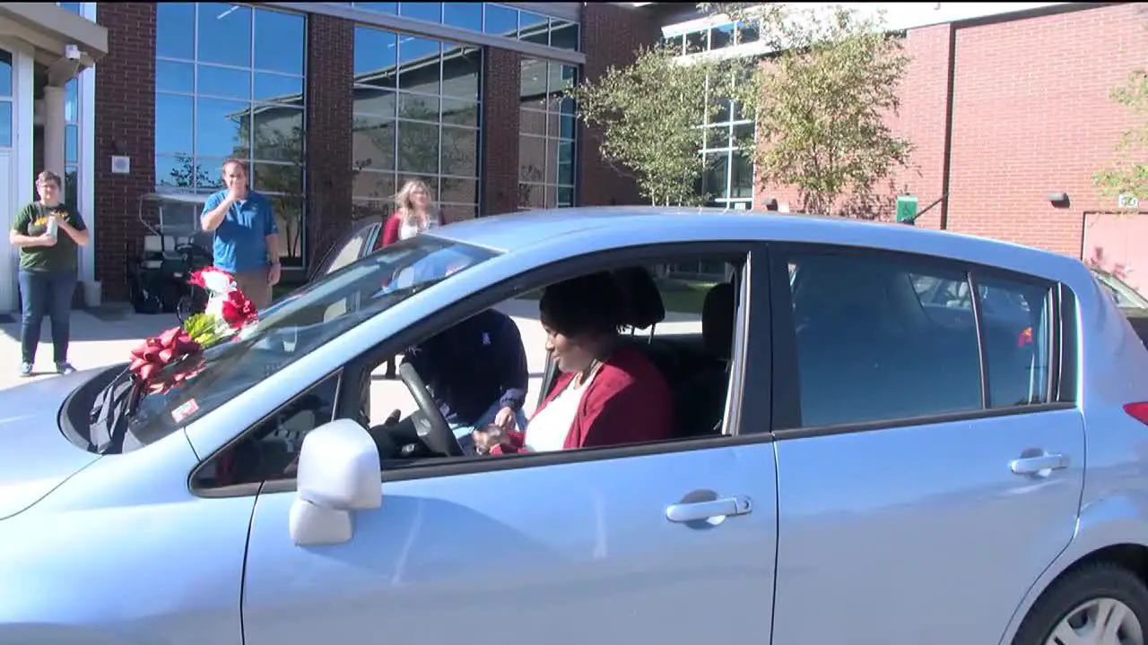 Single mother given car fixed up by Louisa County High School students